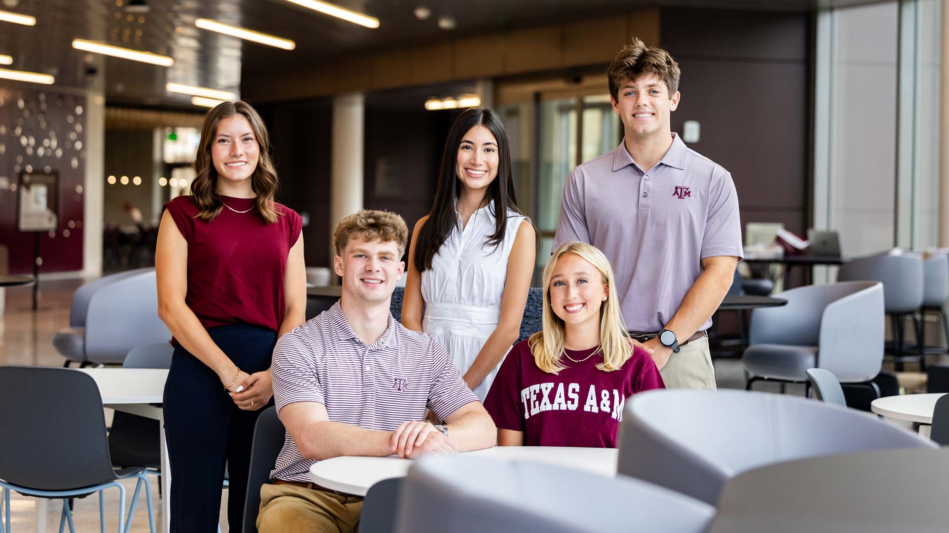 Texas A&M students in the atrium of Mays Business School